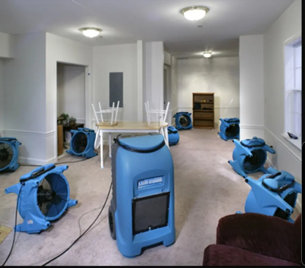Air movers and dehumidifier setup for Water Extraction & Removal in Griffin